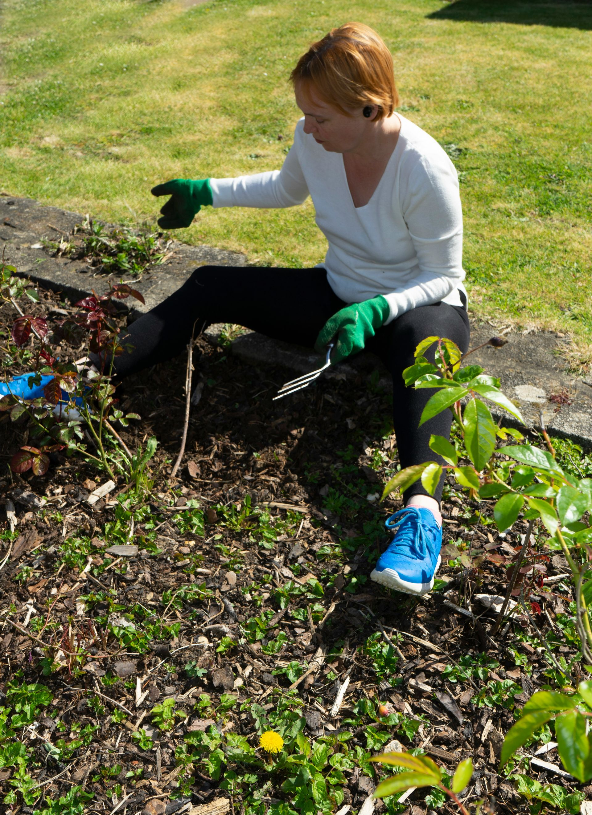 a person digging in the dirt